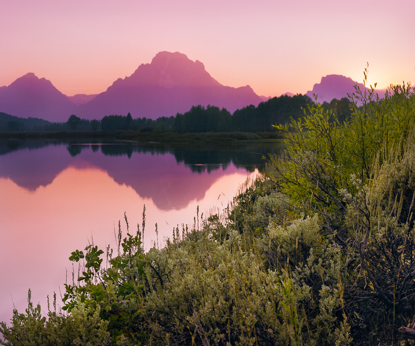 ”The sun does magical things in the mountains. This scene along the Oxbow Bend of the Snake River surrendered to the magic and created a very real demonstration of that phrase in our National Anthem that we all know, but very few of us get to witness.”